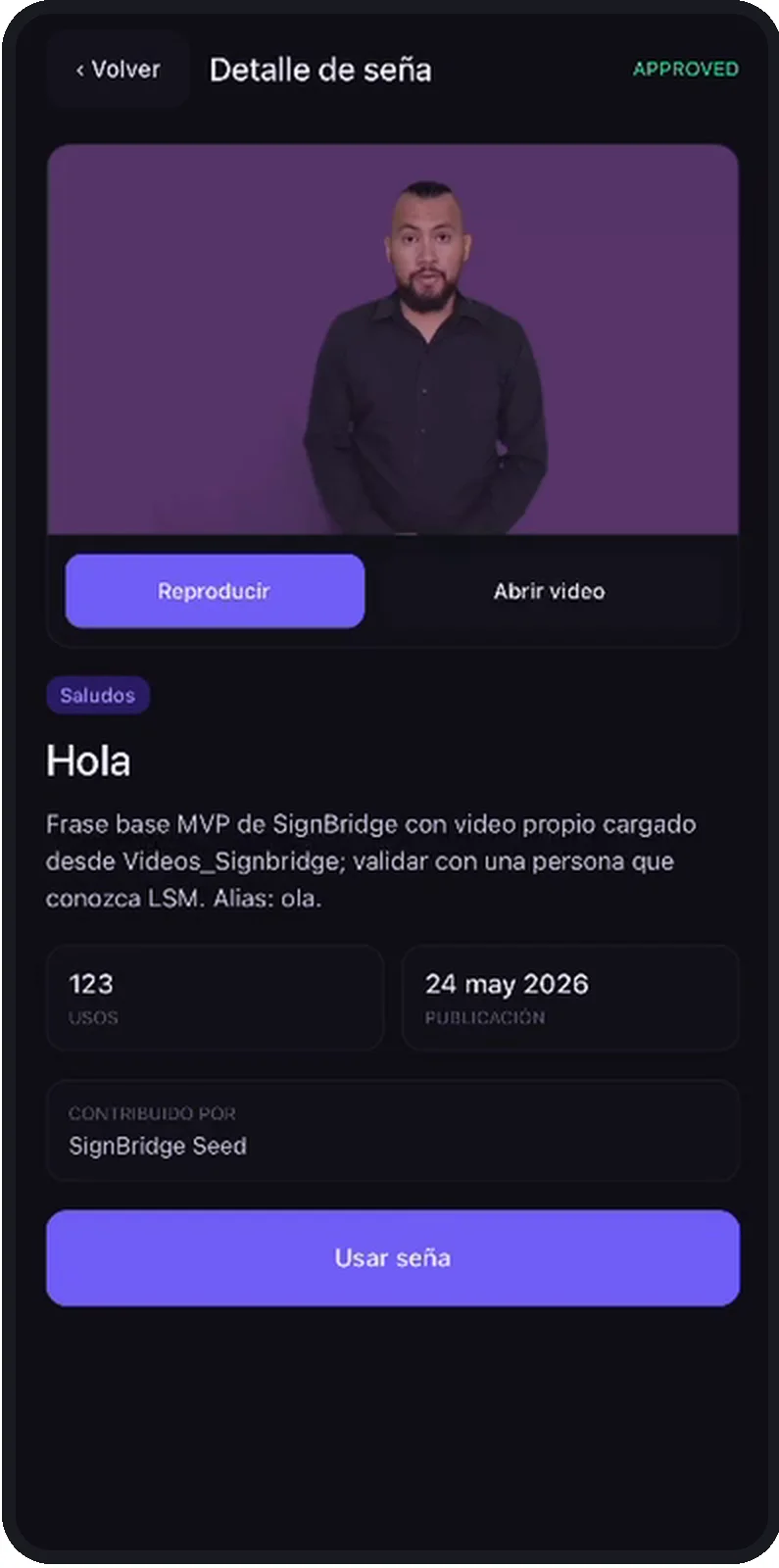 Captura de la app, pantalla Detalle de seña para «Hola»: la descripción dice que es una frase base MVP con video propio y que debe validarse con una persona que conozca LSM.